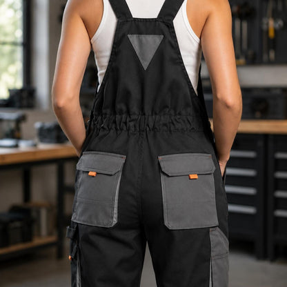 Black bib overalls rear view with gray back pockets.