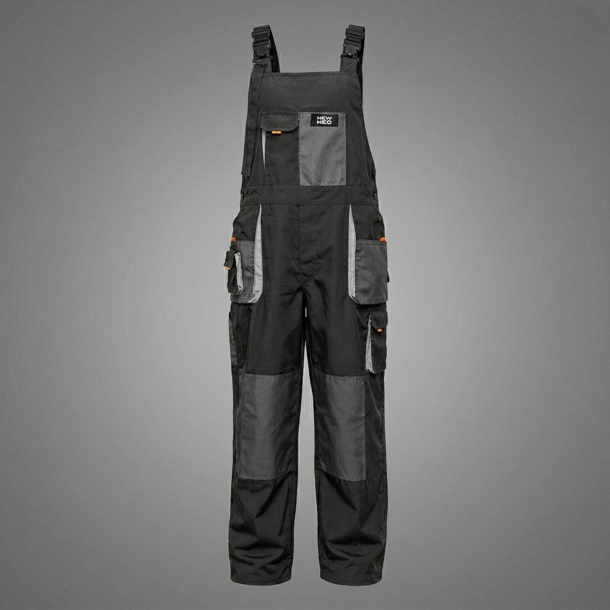 Black overalls with knee panels, pockets, and orange details.