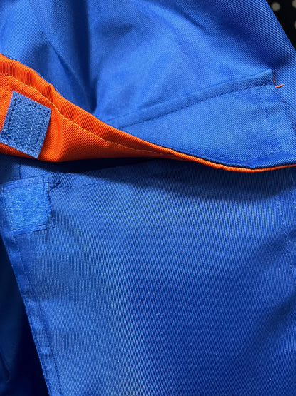 Blue coverall flap pocket with orange lining