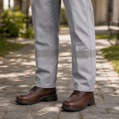 Light-gray trousers and lower-leg reflective band detail.