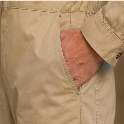 Khaki sleeve, cuff, waist, and side-pocket detail.